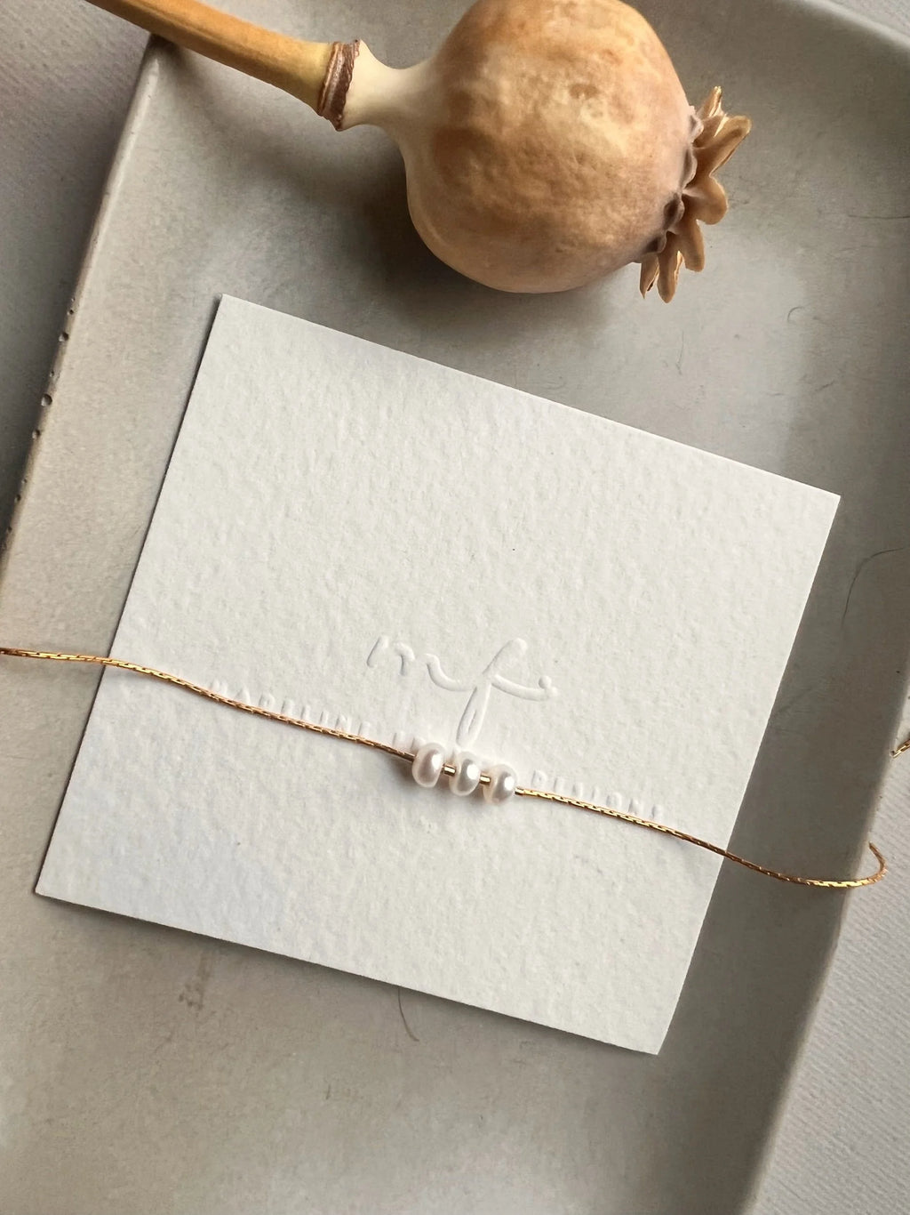 the pearl girl bracelet