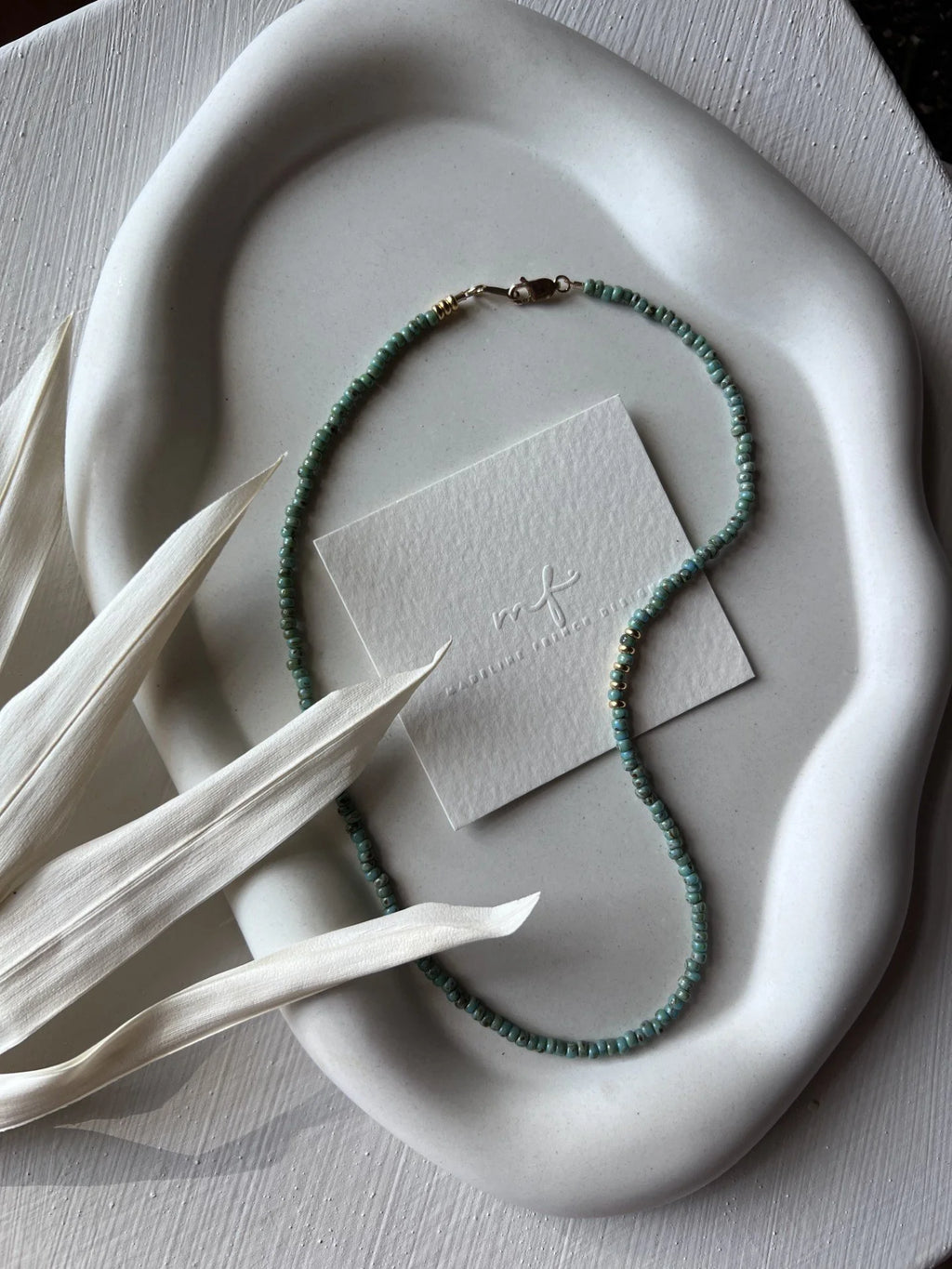 the golden pine necklace