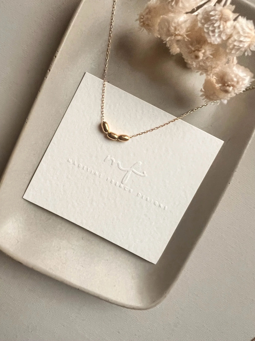 the seed necklace